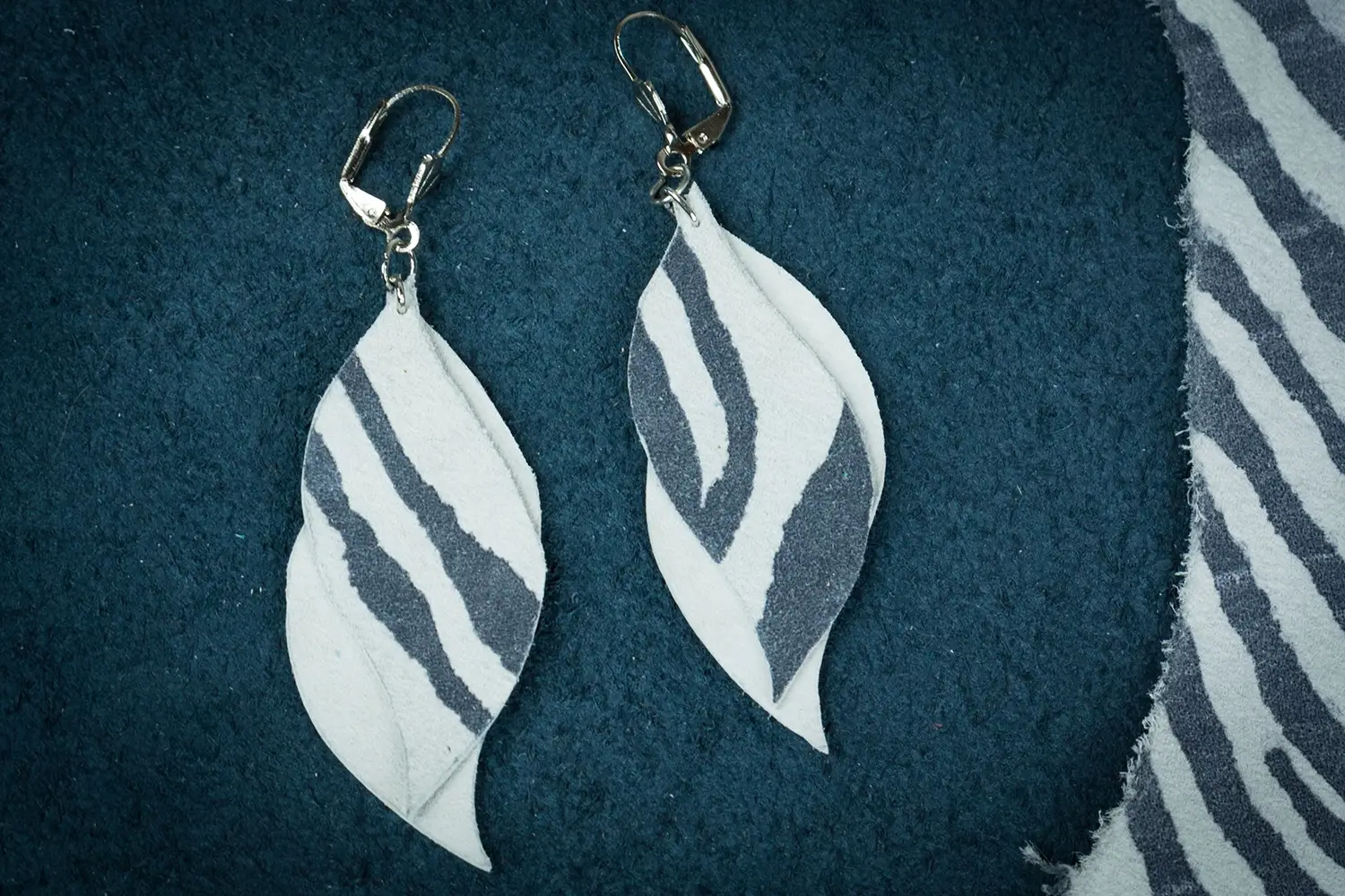 Groovy Fox Upcycled Leather Earrings – White and Zebra Fox Tails — 1/1